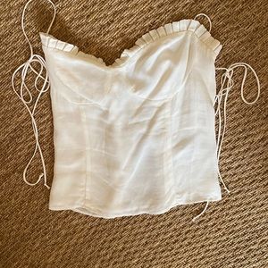 Brand new never worn. White reformation top. Size 6